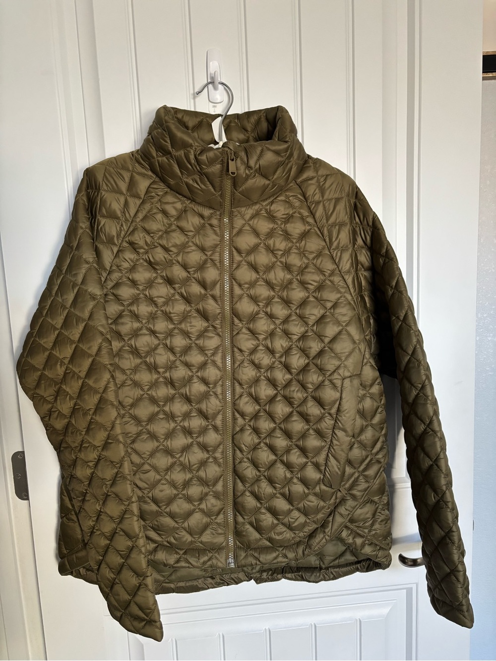 New condition. Athleta whisper featherless jacket.